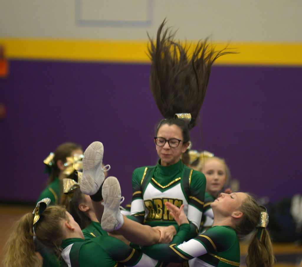 Annie Stagg is caught by her bases